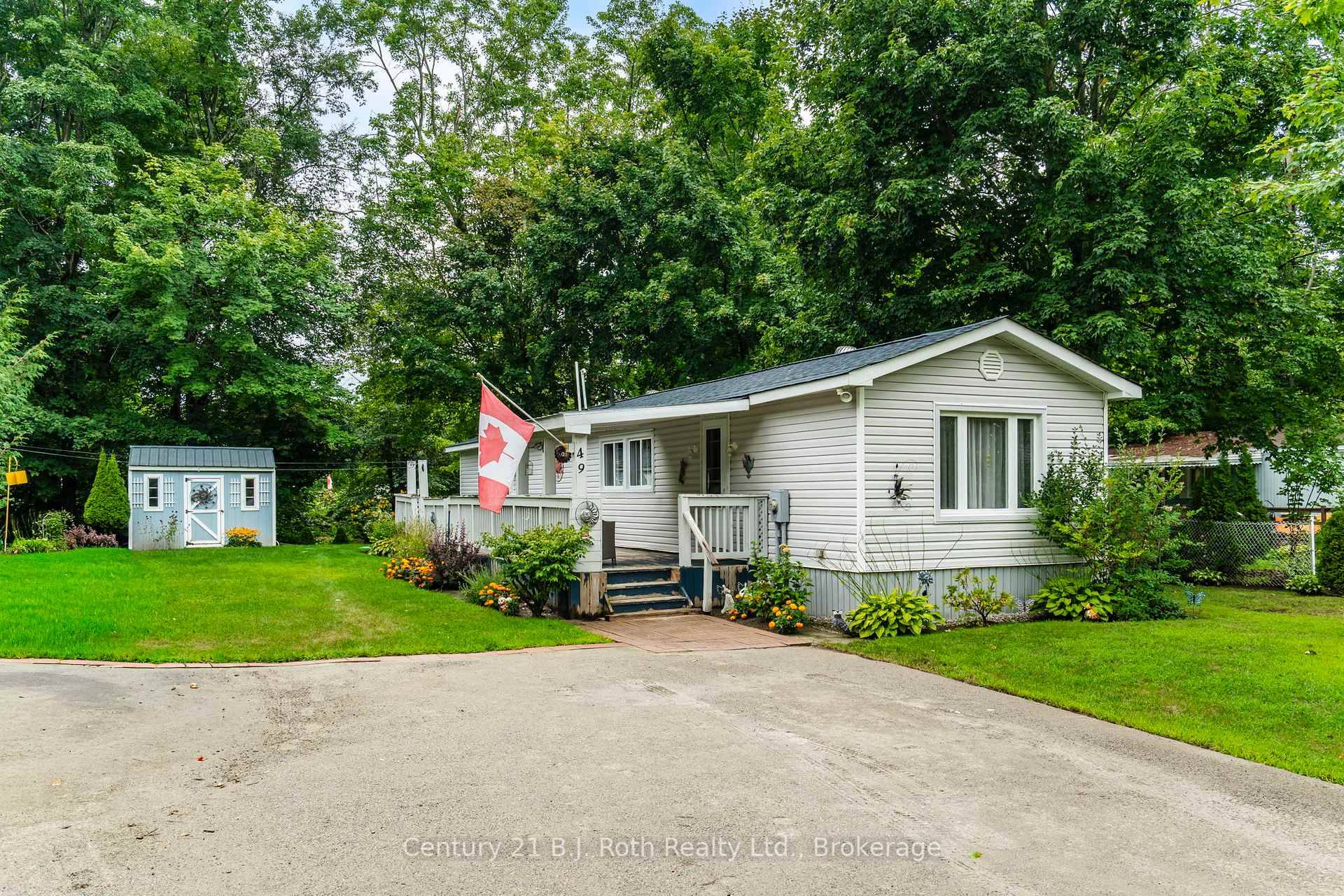 Welcome to this beautifully maintained 2 bedroom modular home, nestled in a peaceful park setting surrounded by woods and nature trails.