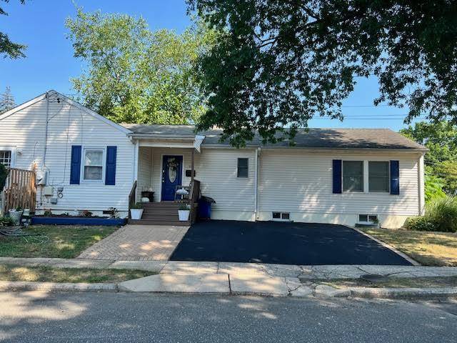 This Expanded Ranch Style Home Sits on and Faces Laurel Court on a dead end block.