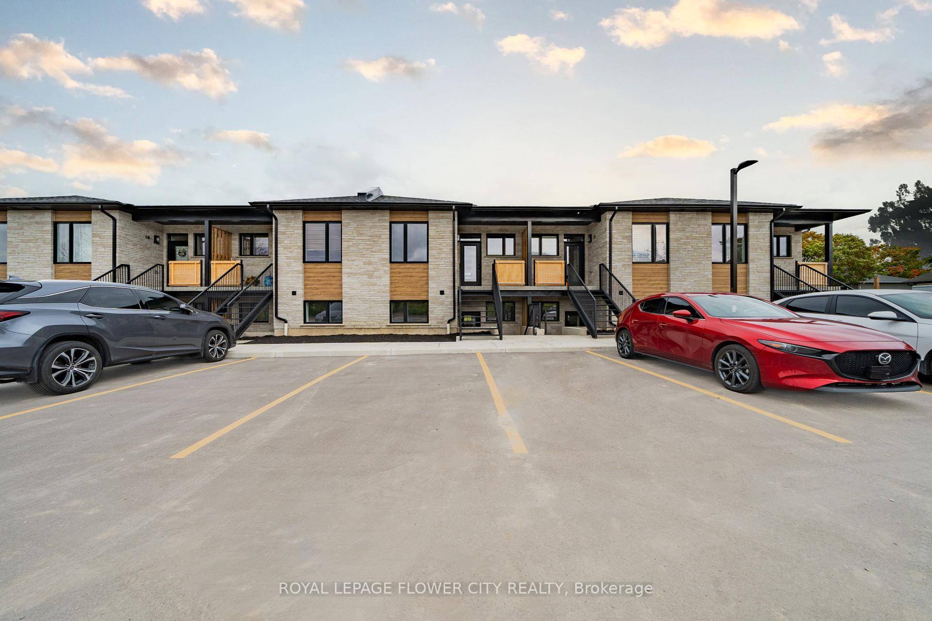 Contemporary 2 bedroom, 2 bathroom stacked townhome featuring a bright open concept layout.