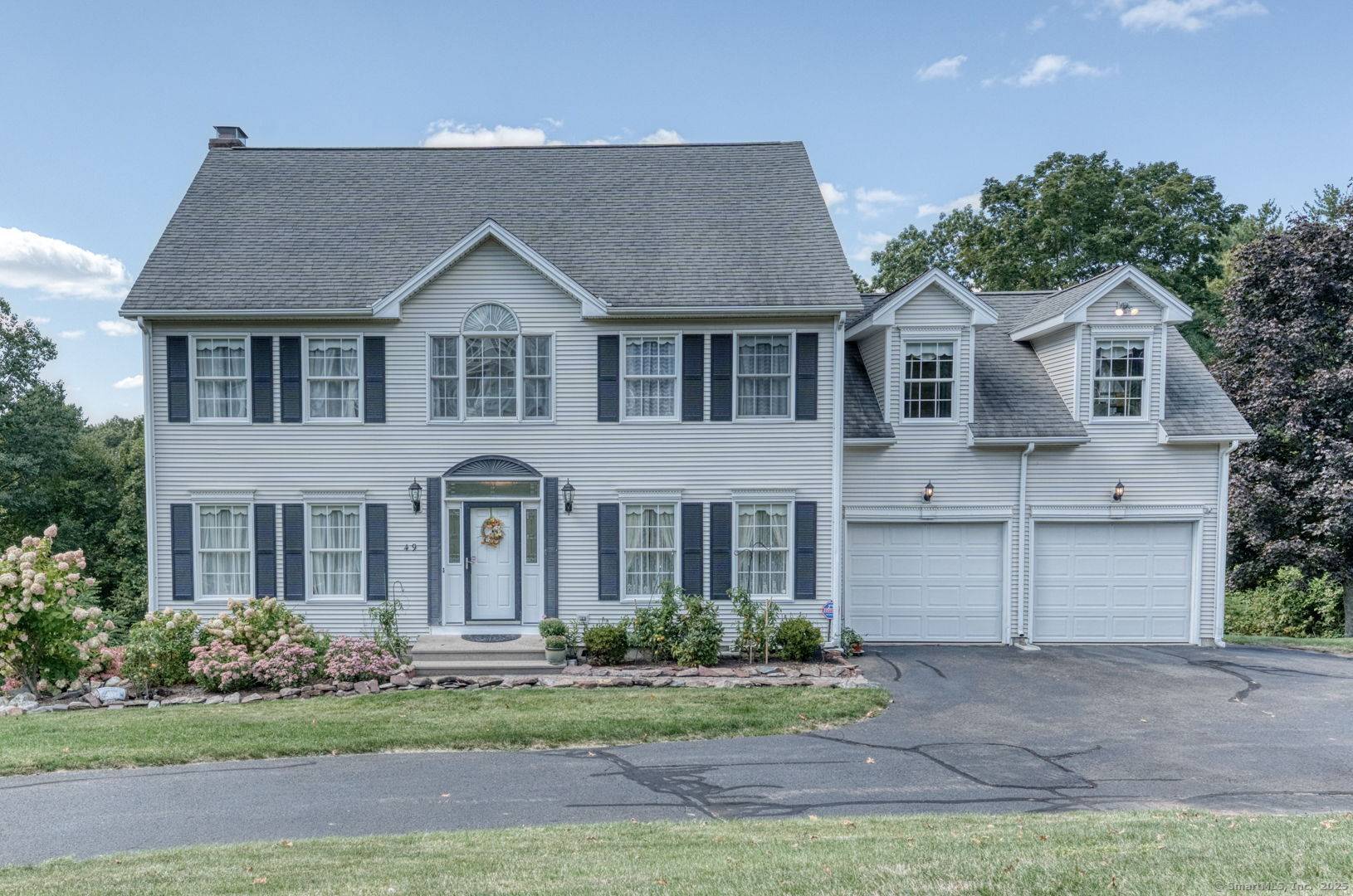 Discover timeless charm and modern comfort in this spacious 2, 558 sq ft Colonial, beautifully situated on a private one acre lot in the heart of Somers.