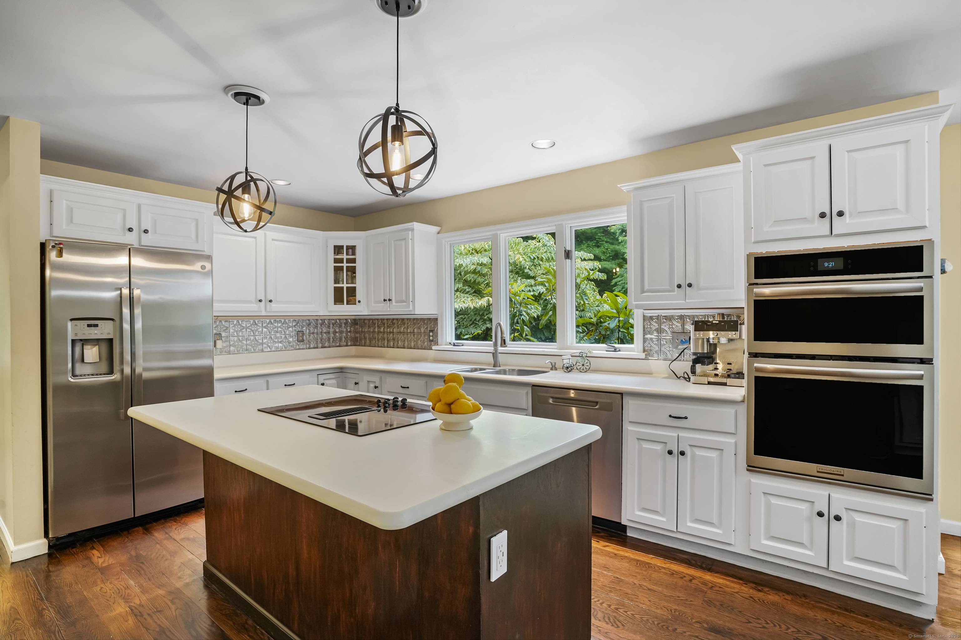 Spacious Colonial home centered on a beautiful property lined by stonewalls and mature plantings, with 4 bedrooms and 3 1 2 baths, is located in a desirable neighborhood on the ...