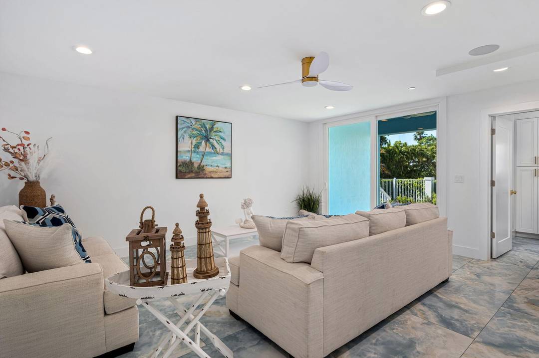 A rare opportunity to own a sophisticated three story luxury residence designed for refined coastal living.