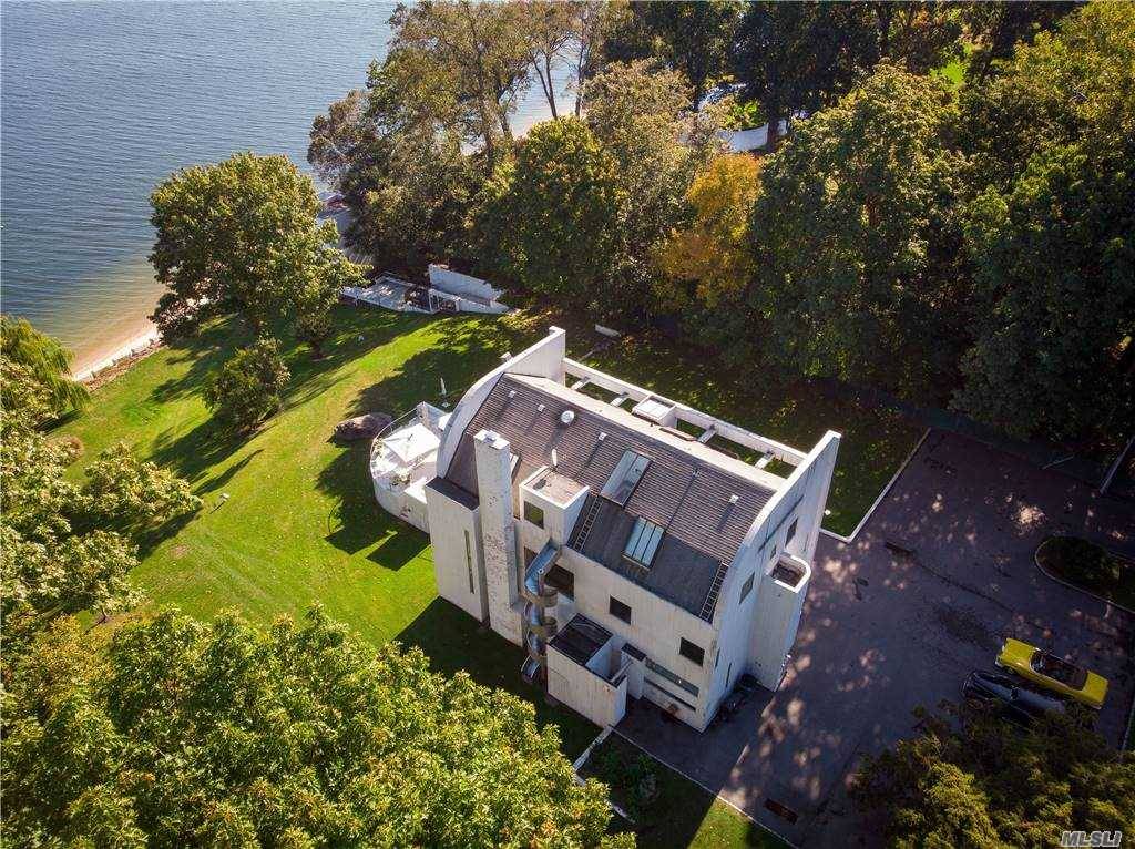 Exquisite grace and grandeur hallmark this magnificent 3 acre Richard Meier masterpiece.