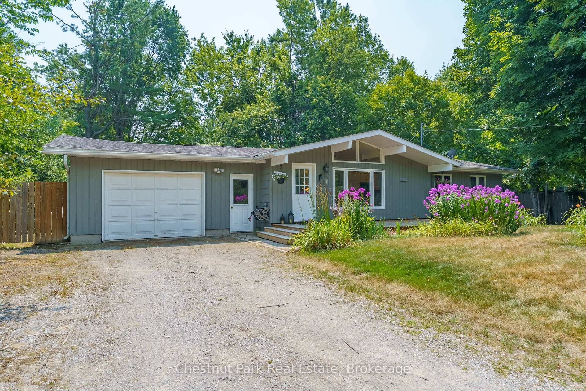 Welcome to 10 McLeish Drive a warm and inviting retreat tucked just outside Orillia in the peaceful community of Sebright.