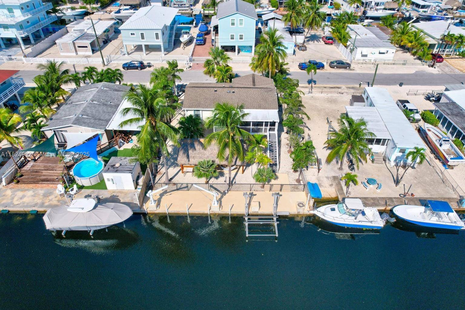 Seller Must Sell ! Bring Your Boat and Start enjoying Keysliving at this Beautiful Bayside Home in Key Largo !