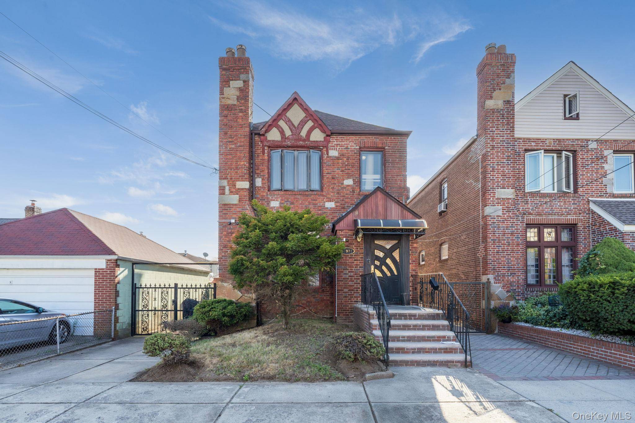 Welcome to 119 72 178th Street a well maintained single family home nestled on a quiet residential block in the heart of Jamaica, Queens.