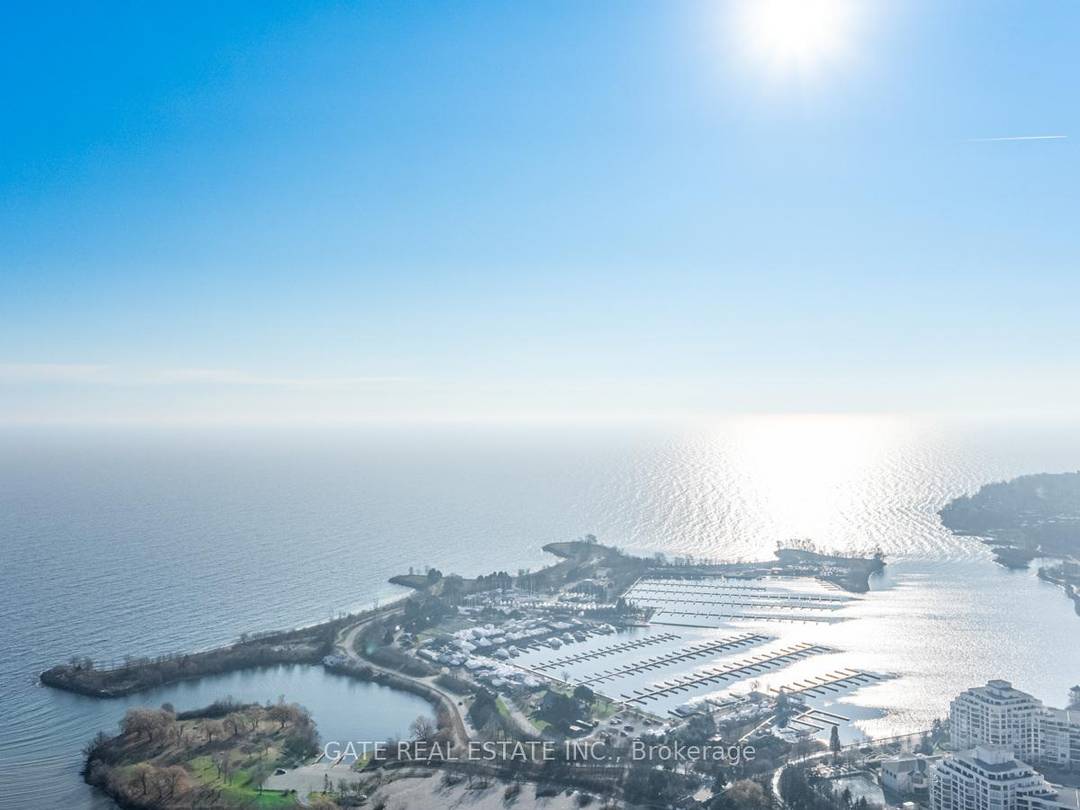 Stunning ! ! ! ! Fully Furnished Corner Unit with Un obstructed view of the City and Lake Ontario right from your Living Dinning Kitchen Den and Bedroom Area.