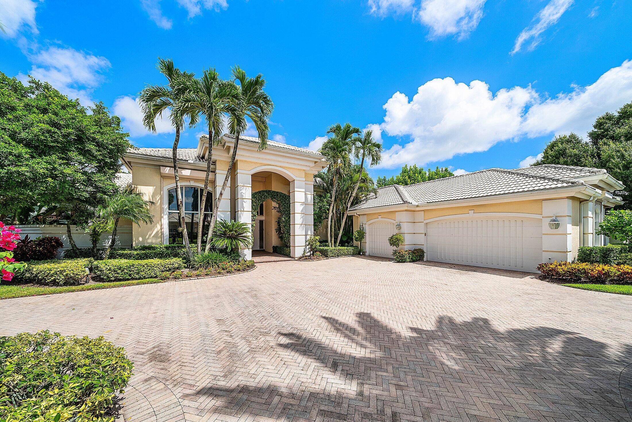 Situated on the North Golf Course in Ballenisles, this spacious one story home offers 5 Bedrooms plus an office, 4.