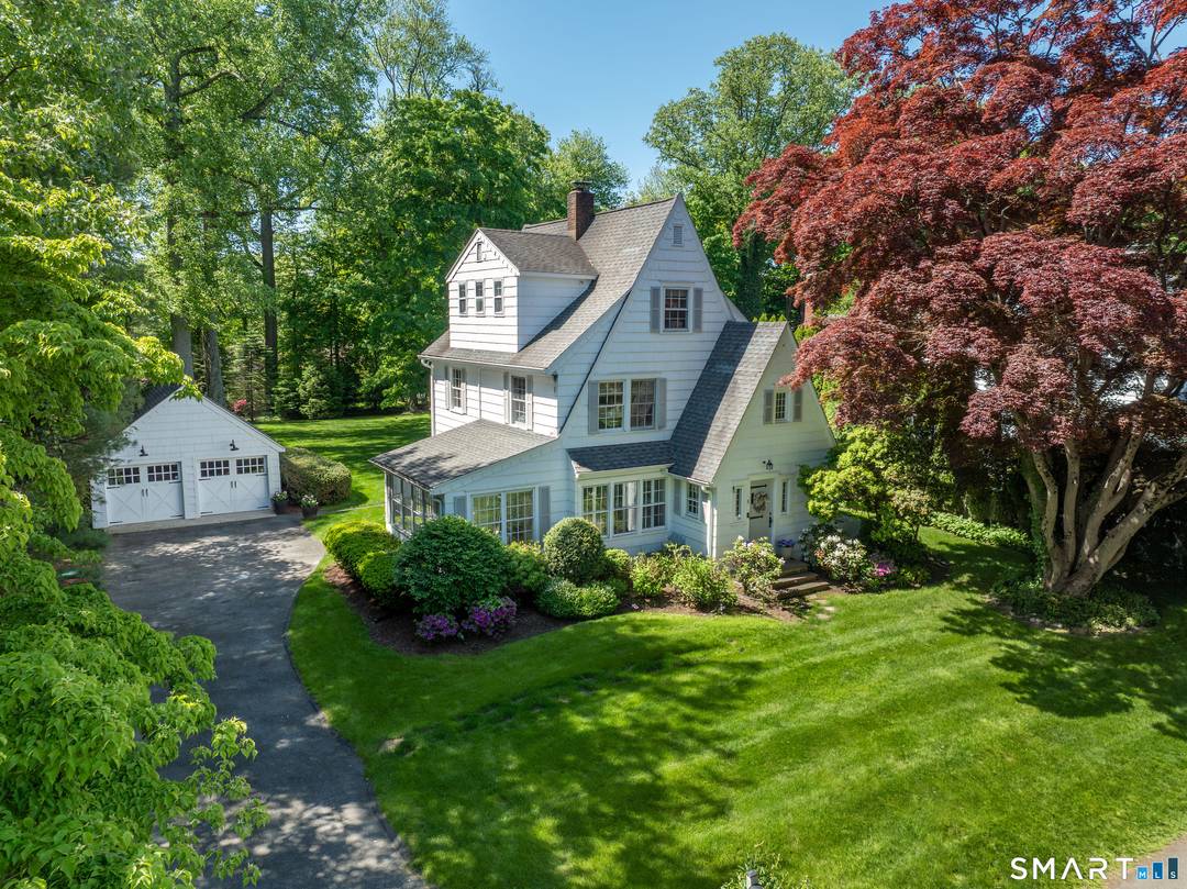 Tucked in the heart of Darien's coveted Noroton Manor neighborhood, this timeless 1926 home is filled with warmth, character, and endless potential.