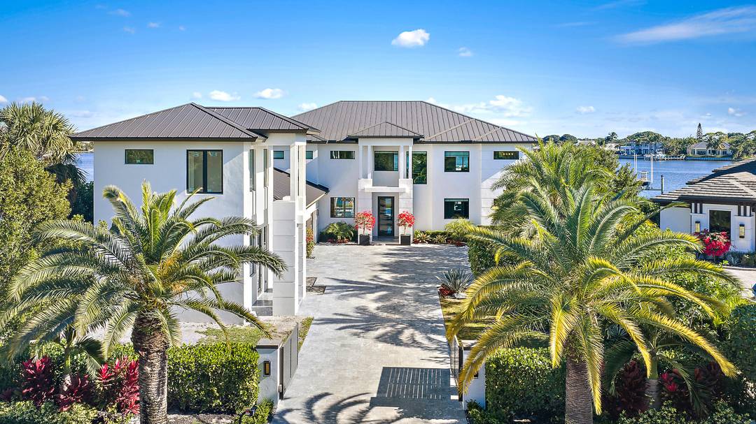Waterfront estate home built in 2022, ideally positioned on a quiet street with fewer than ten homes and offering some of the most impressive views Jupiter has to offer.