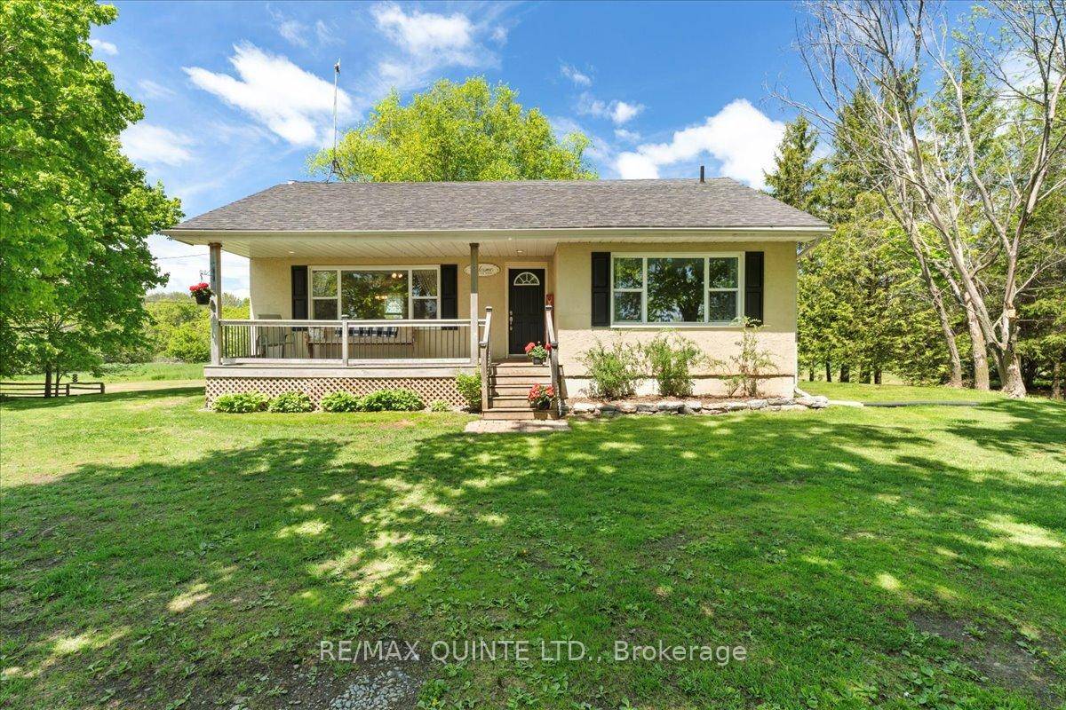 Nestled in the countryside, just a mere 5 minutes from the charming town of Picton, lies a delightful stucco bungalow that epitomizes country charm.