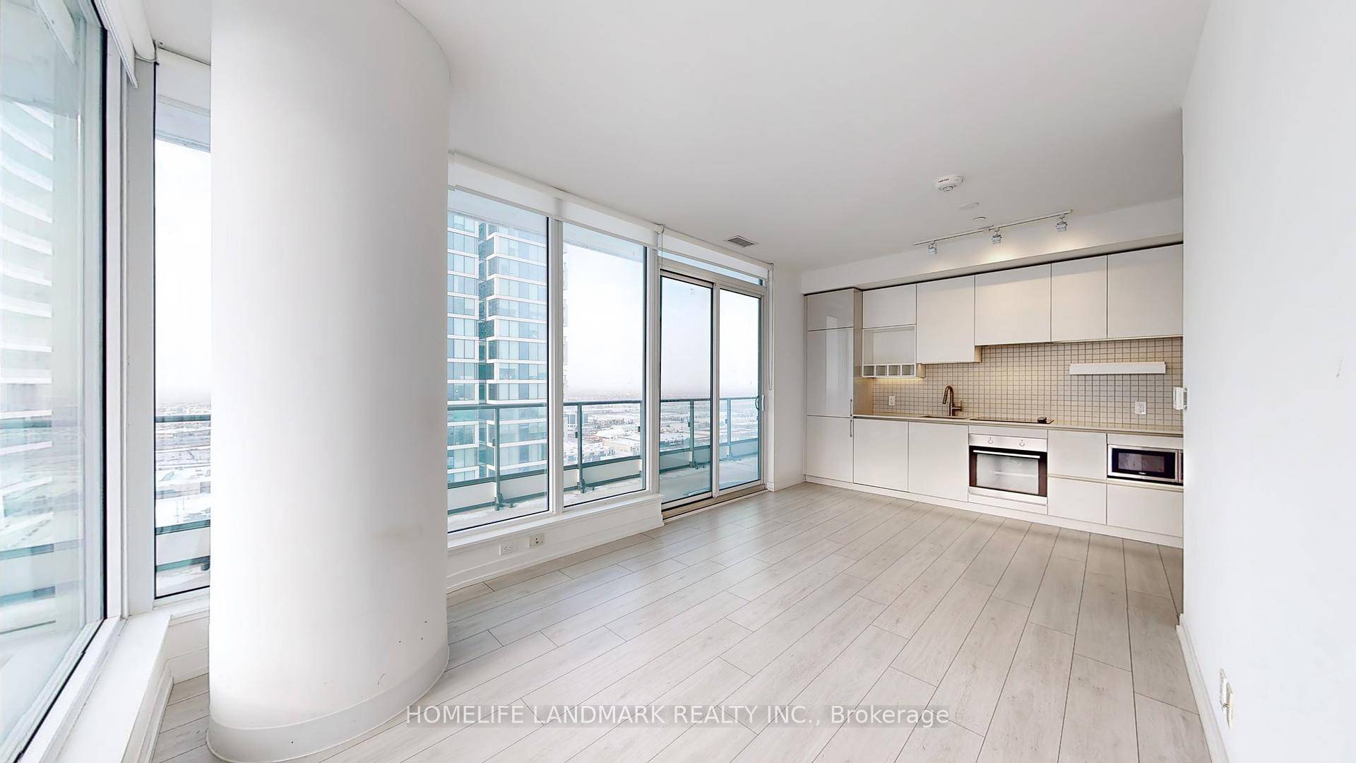 Sought After 2 Bedroom Unit 1 study nook at almost 800 SqFT tall Windows double Balcony Access.