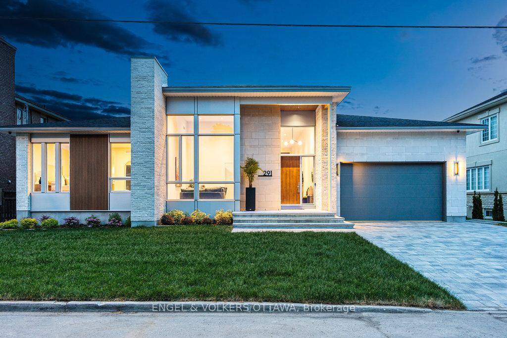 This exquisite custom built residence by Cartesian Homes is a refined blend of modern architectural and timeless elevated design.