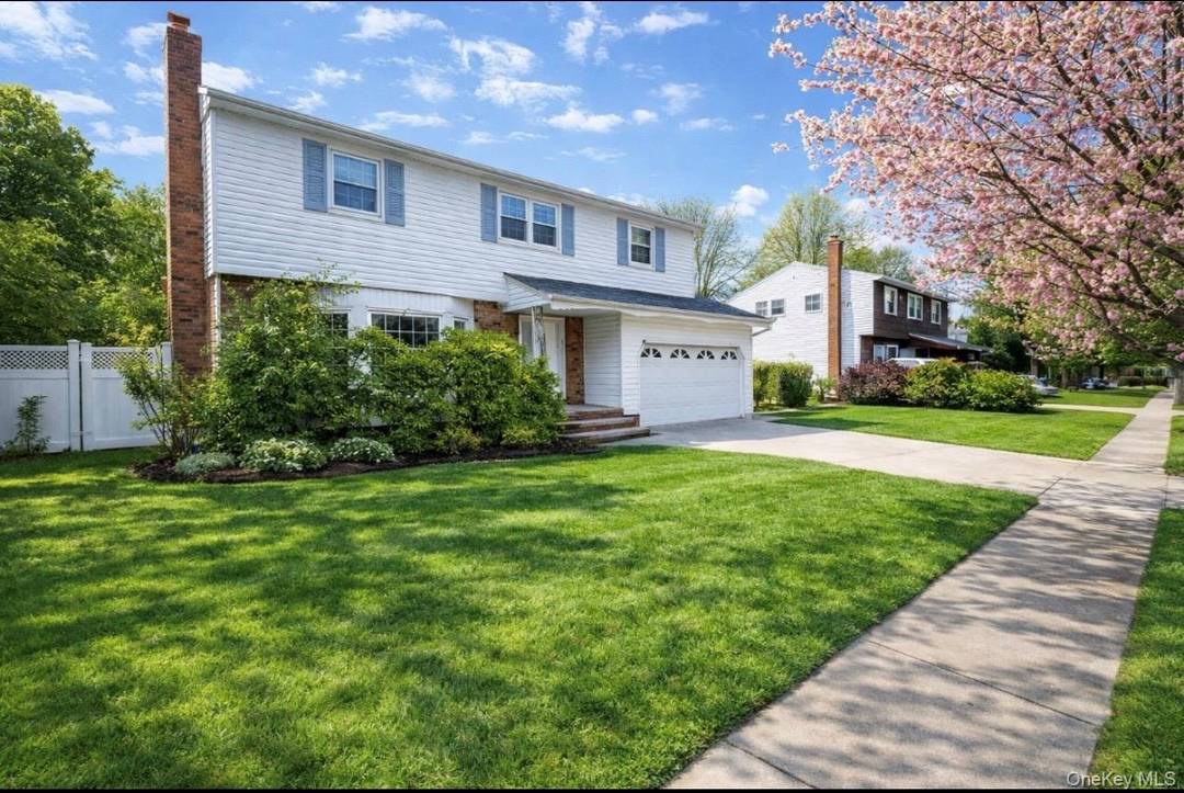 Step into this stunning, fully renovated two story Colonial where timeless charm meets modern luxury perfectly located in one of Massapequa s most desirable neighborhoods, directly across from Charles E.