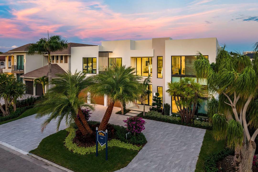 Welcome to 2240 Date Palm Road, a striking new construction estate by Primo Construction set within the prestigious Royal Palm Yacht Country Club.