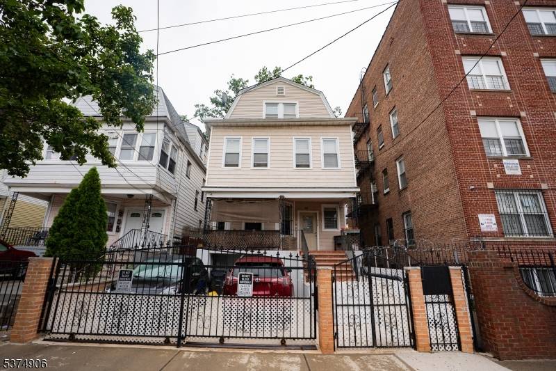 Welcome to this legal 3 family home filled with opportunity and potential !