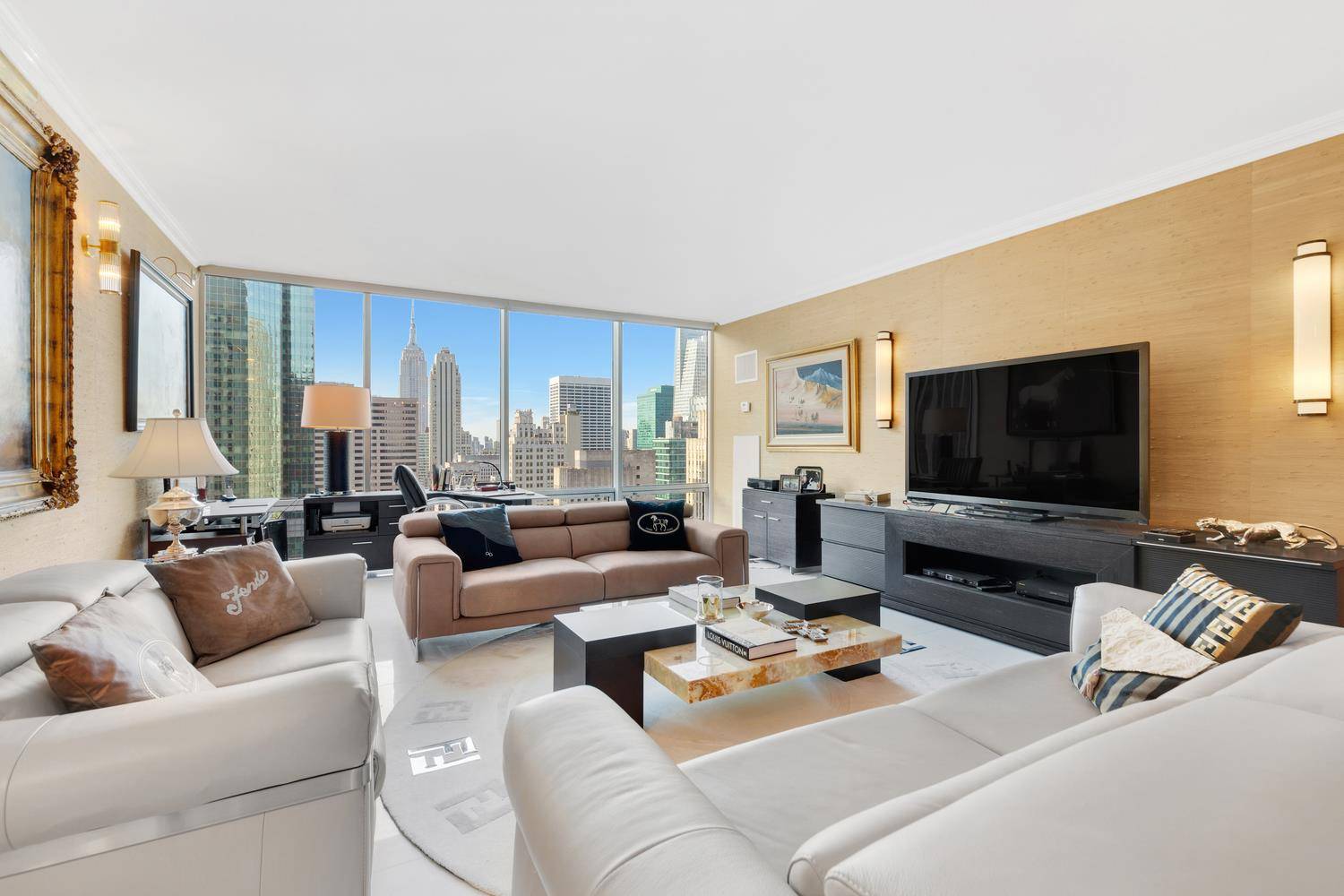 A luxuriously renovated 2 Primary bedroom suites 2.