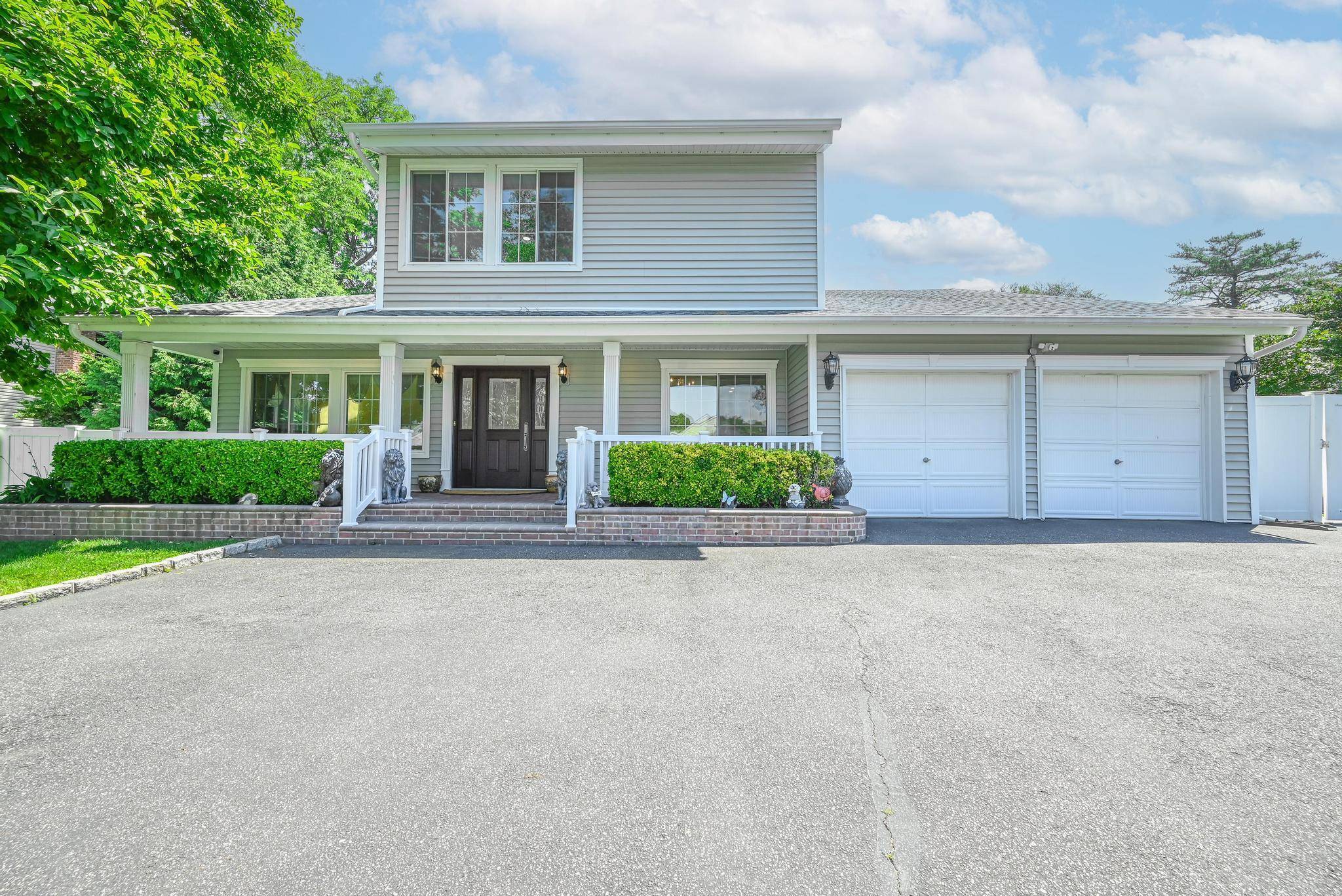 Updated modern single family home in Glen Cove, offering 5 bedrooms, including 2 large bedrooms, and 2.