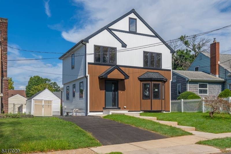 Welcome to this beautifully renovated colonial style home, perfectly situated on the sunny side of Linden.