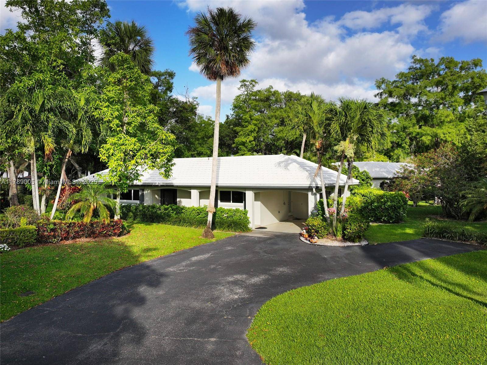 Live on the most exclusive street in Palm Aire.