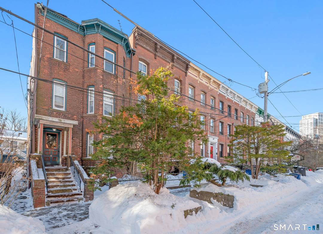 Welcome to 6 Court Street, a 20 foot wide brick building set on one of New Haven's most coveted and picturesque streets, in the heart of the historic Wooster Square ...