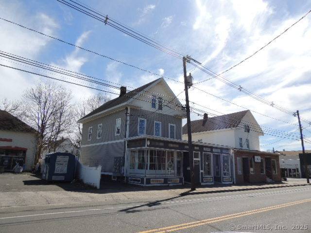 Bases Loaded ! Convert this 2 residential and 2 retail property into 3 residential and retain fourth unit as professional office or retail.