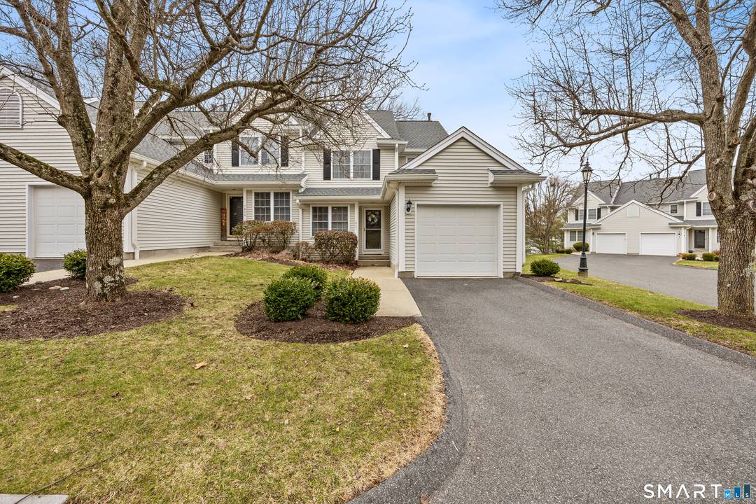 Welcome to this Chestnut model end unit located in a private cul de sac of Sterling Woods, offering the feel of a single family home.