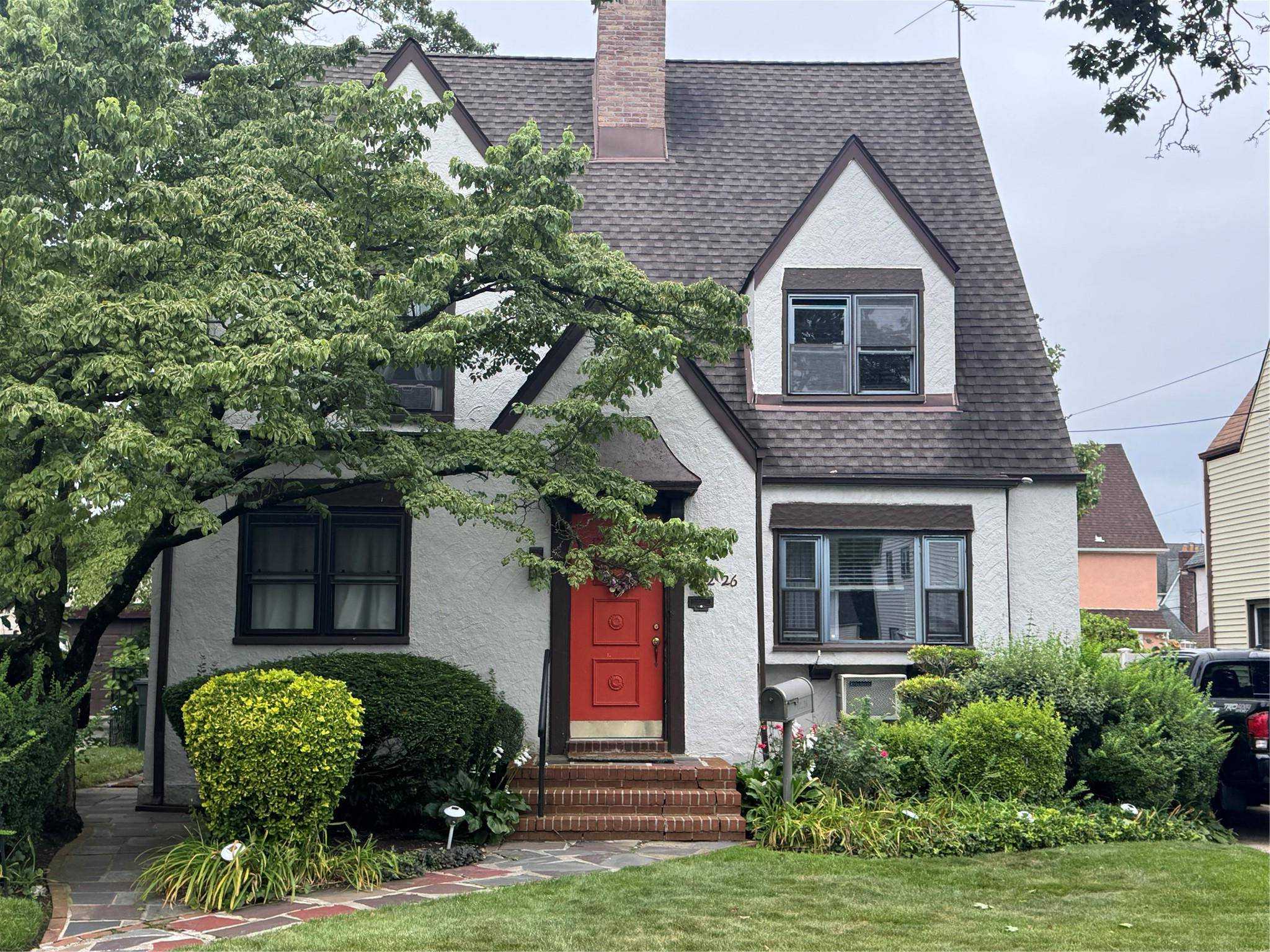 This beautiful Tudor Style property is register as a Historical Landmark, it set on a 5, 000 square foot tree line lot, located in beautiful Addisleigh Park.