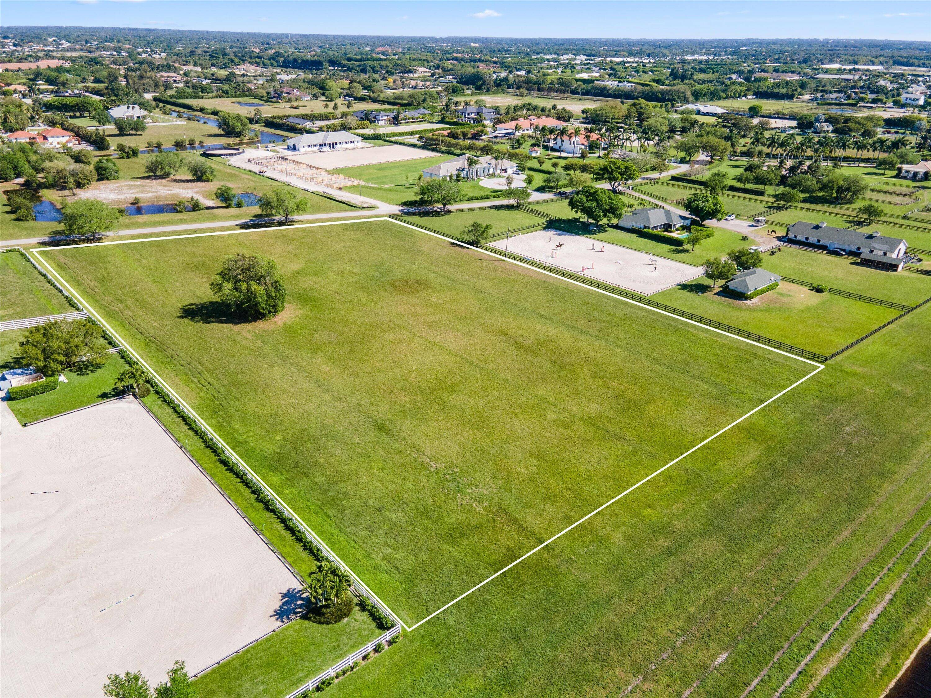 Exceptional opportunity to own one of the last remaining vacant lots in the exclusive gated community of Palm Beach Point.