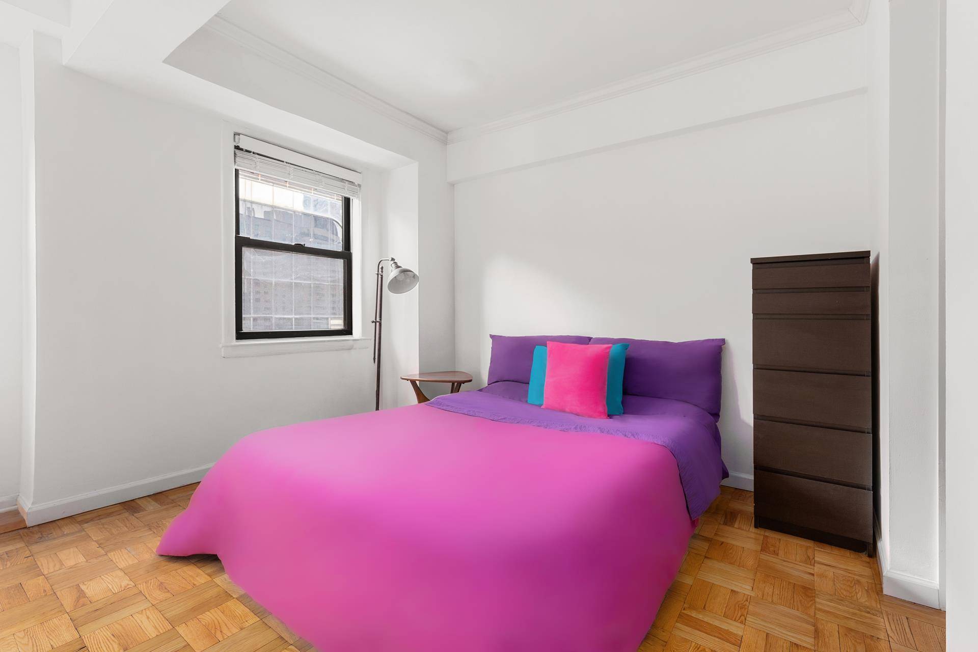 New to market ! Beautiful alcove studio easily convertible into a junior one bedroom which can accommodate a king or queen size bed with two nightstands.