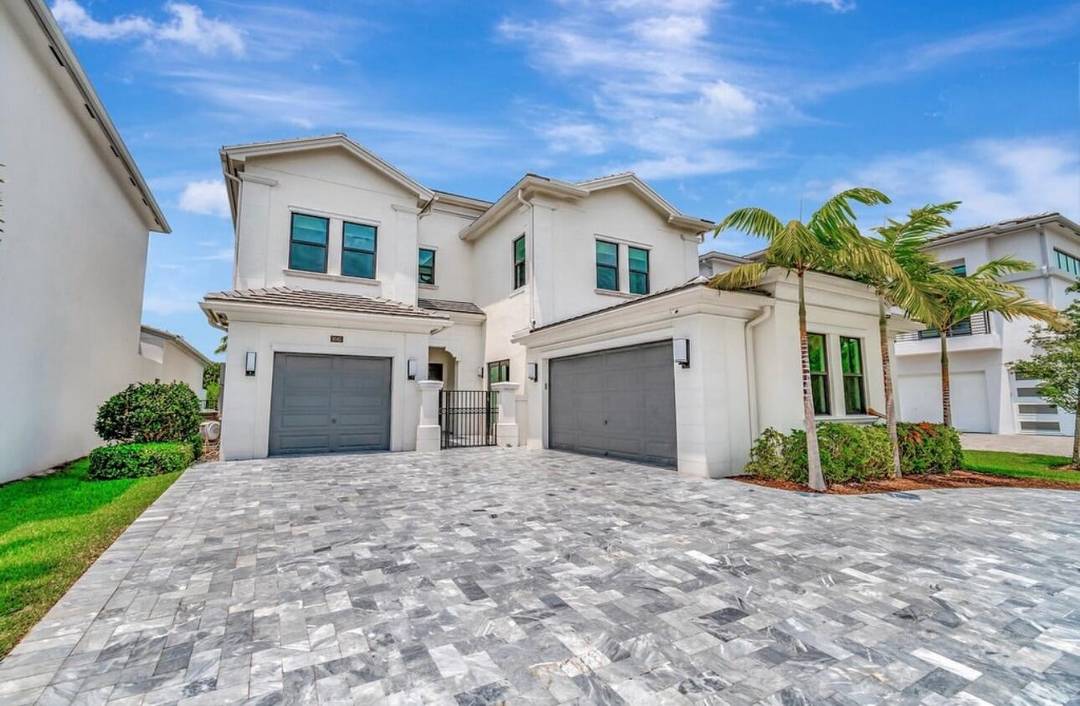 Set on one of the largest lots in Boca Bridges with no rear neighbors, this Sanibel model offers over 5, 330 sq.