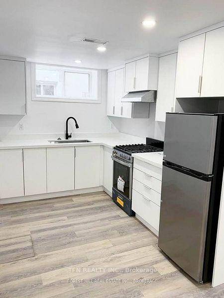 A spacious 4 bedroom, 2 washroom lower level unit !