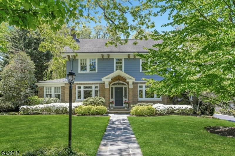 Beautifully blending timeless character with thoughtful modern updates, this exceptional Colonial offers an ideal floor plan, gracious living spaces, a.