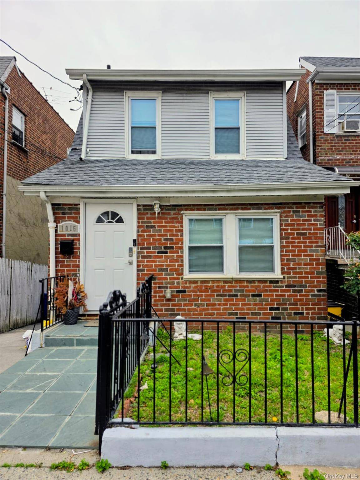 Welcome to 1015 Revere Avenue, a beautiful single family home completely reimagined, where the classic character of 1930s brick meets a sleek, modern finish.