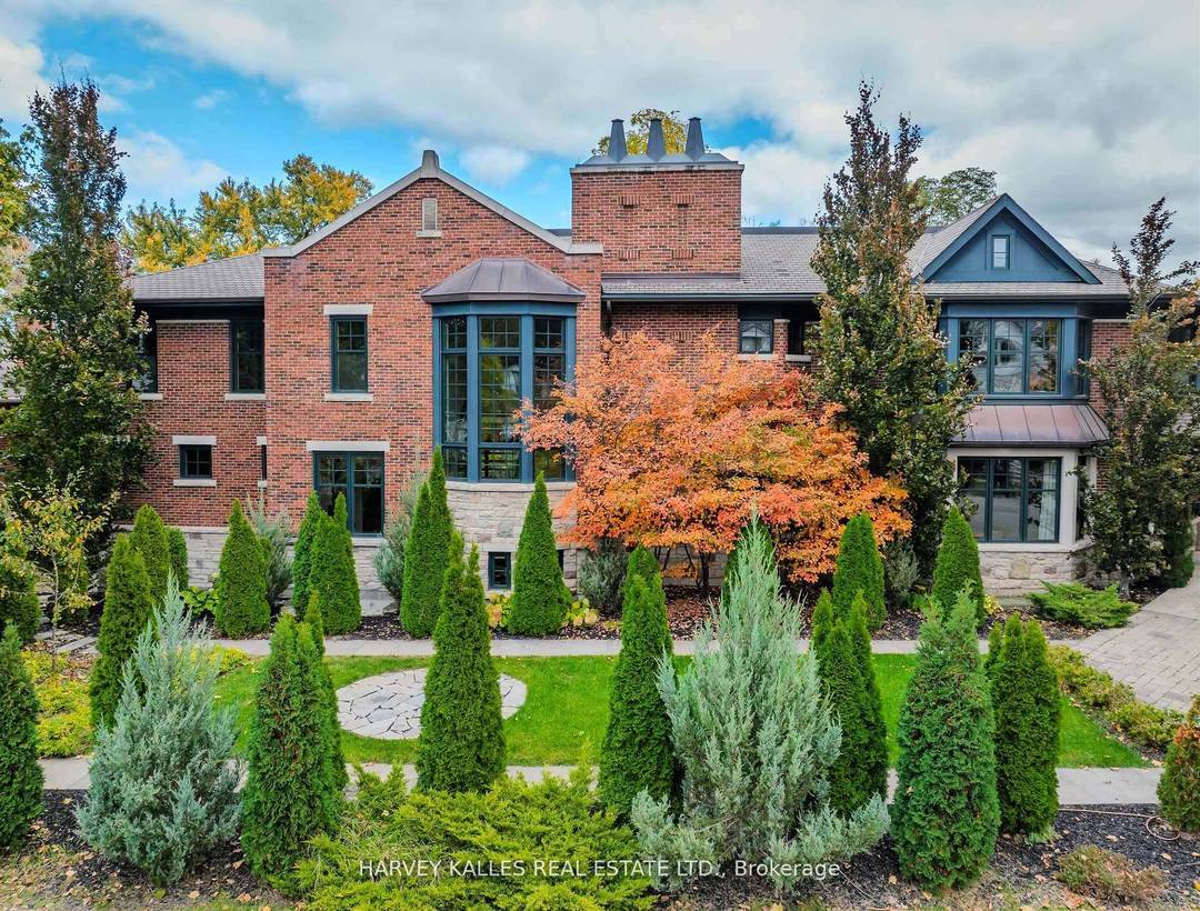 Discover a gem, custom built as a multi generational home, offering over 11, 000 sq ft of luxurious living space on a rare 125ft double lot at the edge of ...