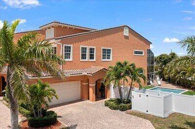 Discover beachside luxury in this beautifully designed 5 bedroom, 4.