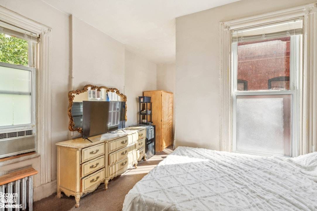 Tucked behind a wrought iron gate along a cobblestone lane, 7 Sylvan Court offers a rare opportunity to own a piece of Harlem's history.
