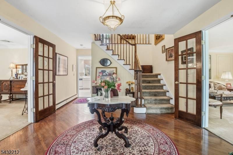 Don ? t miss this spacious 4 bedroom, 3 full bath Center Hall Colonial set on over 2 private acres in a desirable lower West Milford location.