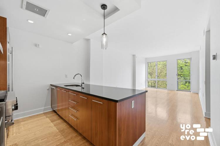 Welcome to apartment 3C at 415 Leonard Street a spacious, functional one bedroom condo featuring a private balcony and direct views of McCarren Park.