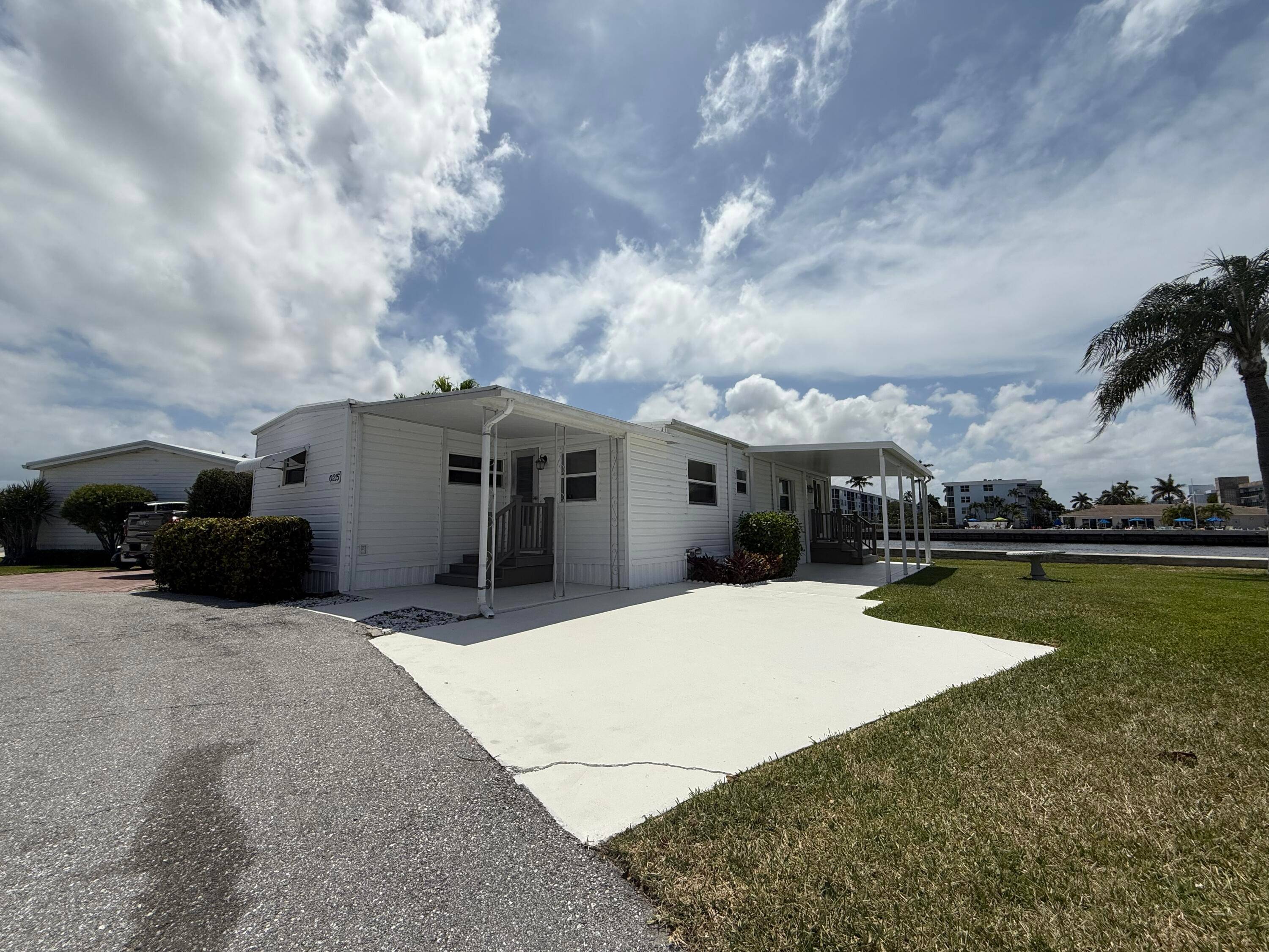 54 SHARES OF STOCK ! Unparalleled Waterfront Living in Briny Breezes !