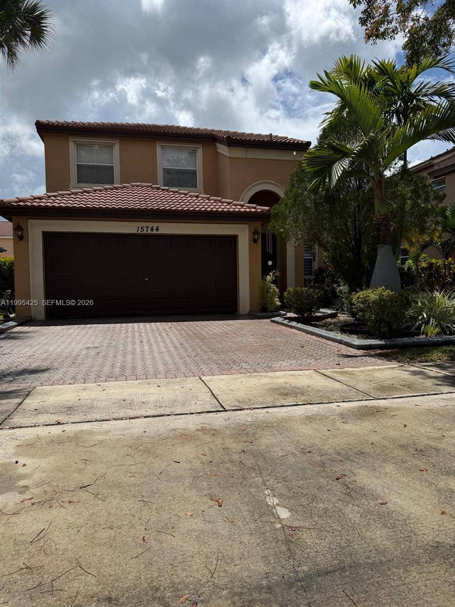 Welcome to this beautifully maintained residence located in the prestigious gated community of Riviera Isles in Miramar.