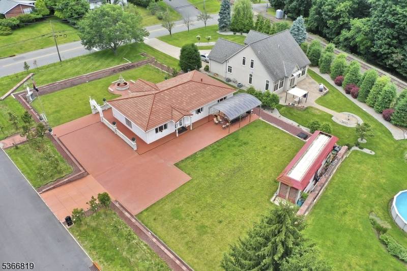 Experience this exquisite Roman Spanish Villa Inspired Estate located in highly sought after Great Notch section of Little Falls less than 30 minutes from NYC.
