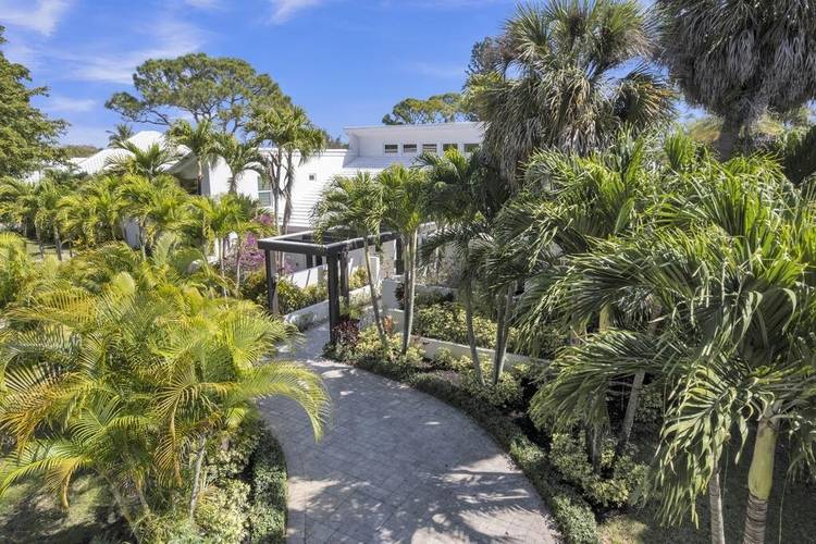 Welcome to one of the most exceptional homes and private lots in the non mandatory Seagate Golf Club just 2 miles from the heart of downtown Delray Beach.
