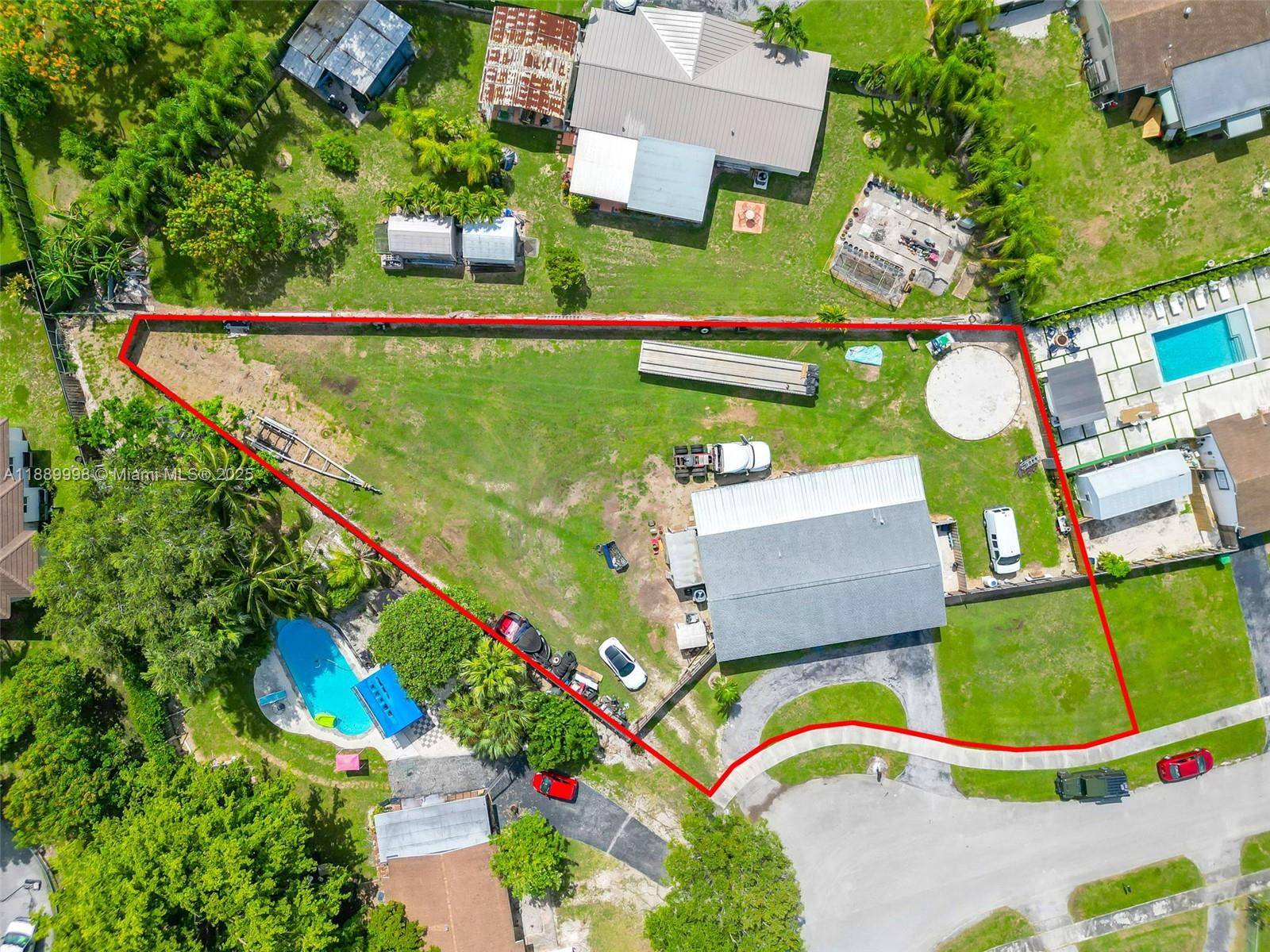 This 3bed 2bath a huge fenced yard front amp ; back due to cul de sac, with room for a pool, all your toys amp ; THEN SOME !