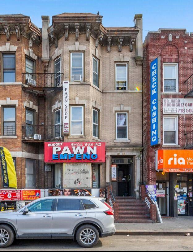 Fully occupied mixed use building located in high traffic area at the intersection of Baxter Ave, Ithaca St, and 82nd St.