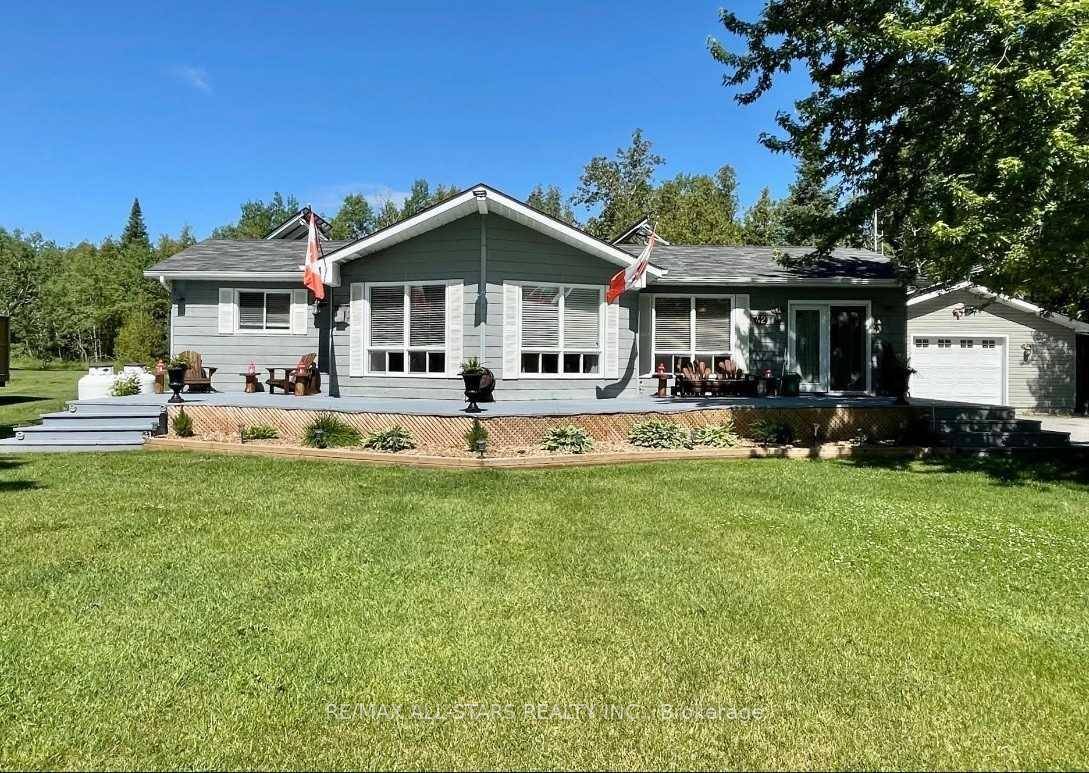 Beautiful Bungalow Situated On A Private Half Acre Lot W A Registered Easement Granting Access To Canal Lake amp ; Trent Severn Water System.