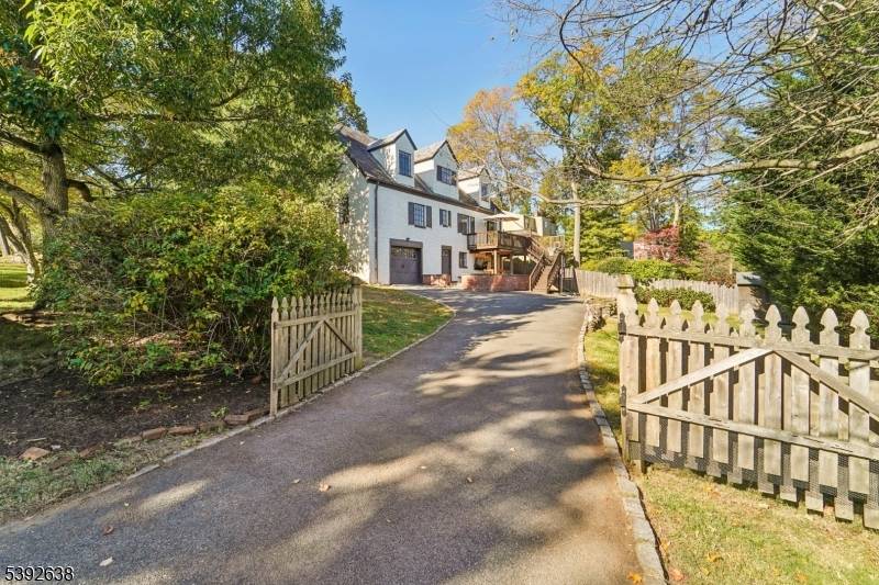 This warm and inviting 3 bedroom, 3 bath, 1930's Tudor home is filled with timeless elegance.