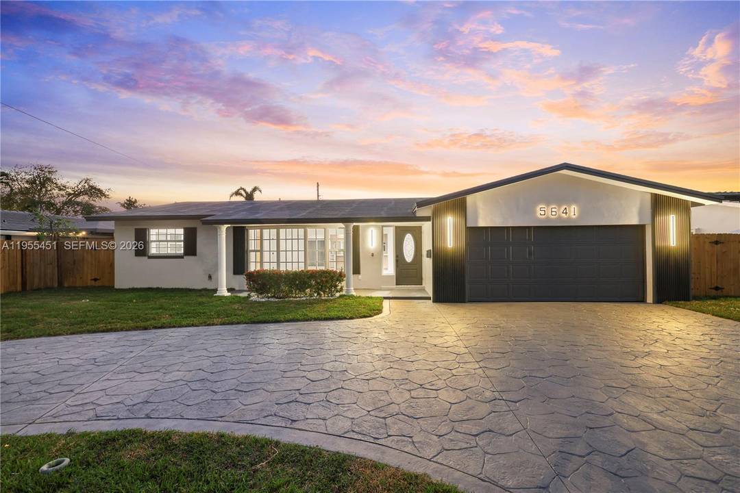 Fully renovated home with fully fenced pool in coveted Imperial Point !