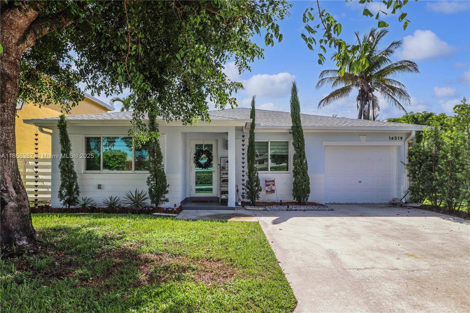 Welcome to this beautifully updated home in Country Walk, perfectly situated directly across from a park for easy access to green space and recreation.