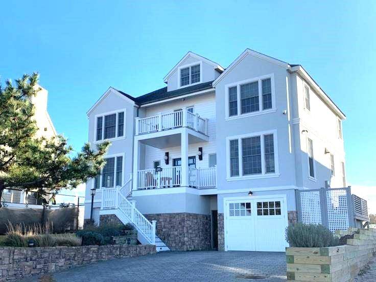 Beautifully detailed and well appointed 3, 130 square foot Mediterranean style oceanfront beach home.